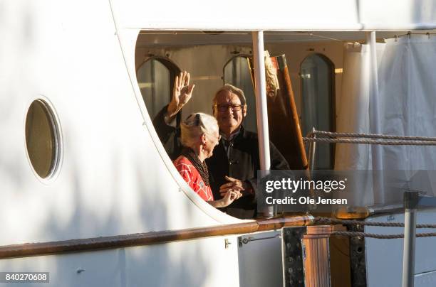 Queen Margrethe of Denmark receives Prince Henrik upon his arrival at the dinner party to celebrate the 18th birthday of Prince Nokolai hosted by...