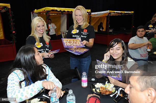 The Laker Girls interact with kids at the 2008 Los Angeles Lakers holiday party on December 13, 2008 at Toyota Sports Center in El Segundo,...