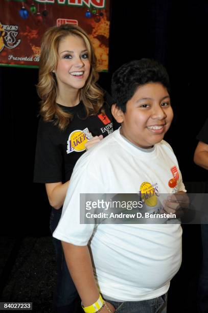 Participant of the 2008 Los Angeles Lakers holiday party has his shirt signed by a Laker Girl at Toyota Sports Center on December 13, 2008 in El...