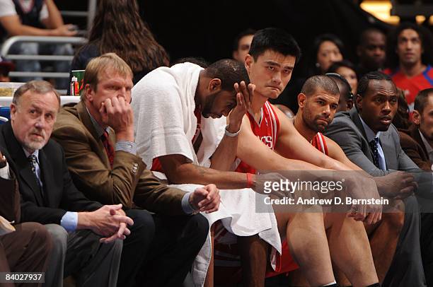 Tracy McGrady and Yao Ming of the Houston Rockets react from the bench during their game against the Los Angeles Clippers at Staples Center on...