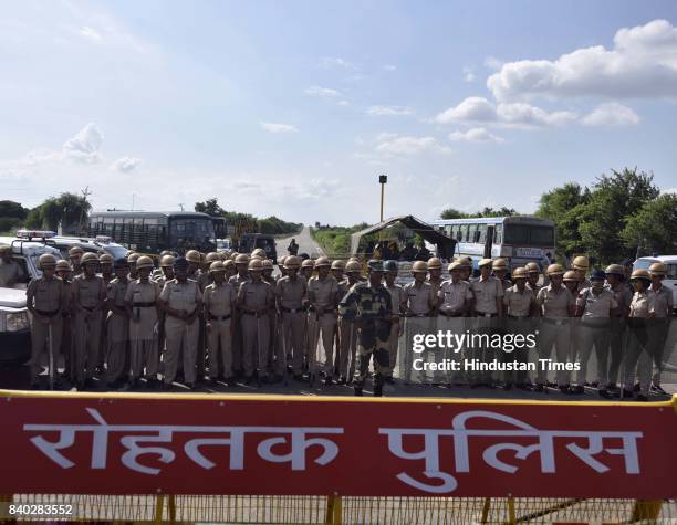 Heavy security deployed near Sunaria district jail where the sentence is to be pronounced against the Dera Sacha Sauda cult chief Gurmeet Ram Rahim...