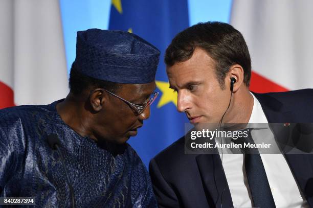 French President Emmanuel Macron and President of Tchad Idriss Deby Itno react during a press conference after the multinational meeting at Elysee...