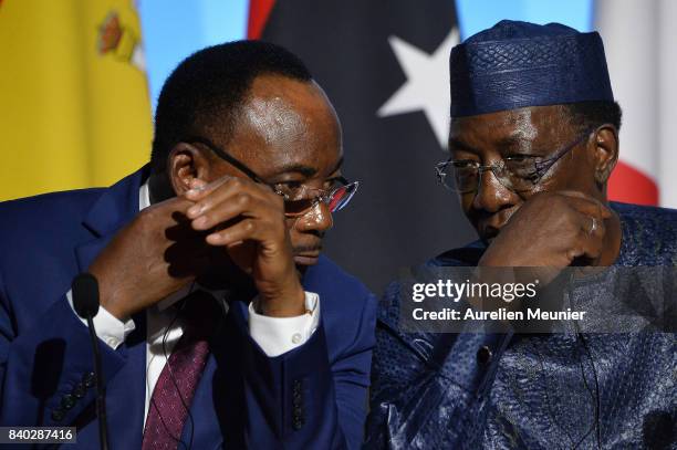 Mahamadou Issoufou President of Niger and President of Tchad Idriss Deby Itno react during a press conference after the multinational meeting at...