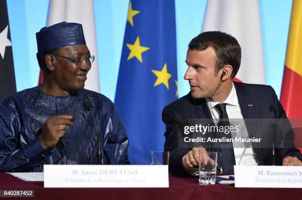 French President Emmanuel Macron and President of Tchad Idriss Deby Itno react during a press conference after the multinational meeting at Elysee...