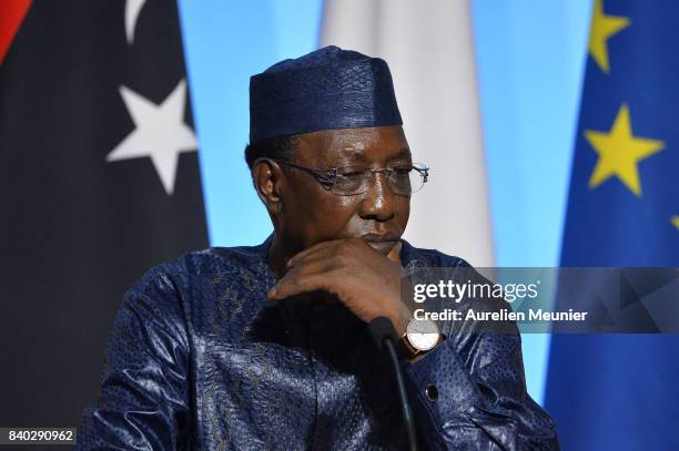 President of Tchad Idriss Deby Itno reacts during a press conference after the multinational meeting at Elysee Palace on August 28, 2017 in Paris,...