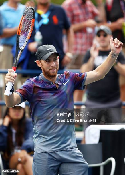 Dudi Sela of Israel celebrates his victory over Christopher Eubanks of the United States after their first round Men's Singles match on Day One of...