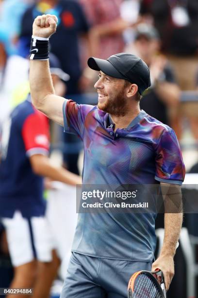 Dudi Sela of Israel celebrates his victory over Christopher Eubanks of the United States after their first round Men's Singles match on Day One of...