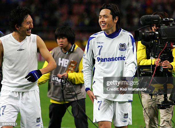 Gamba Osaka players Yasuhito Endo and Hideo Hashimoto celebrate their win after FIFA Club World Cup Japan 2008 match between Adelaide United and...