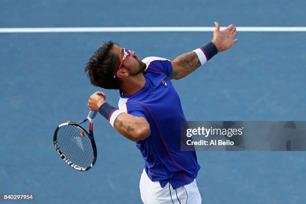 Janko Tipsarevic of Serbia serves during his first round Men's Singles match against Thanasi Kokkinakis of Australia on Day One of the 2017 US Open...
