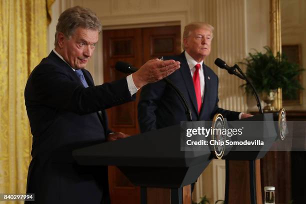 Finnish President Sauli Niinisto and U.S. President Donald Trump hold a joint news conference in the East Room of the White House August 28, 2017 in...