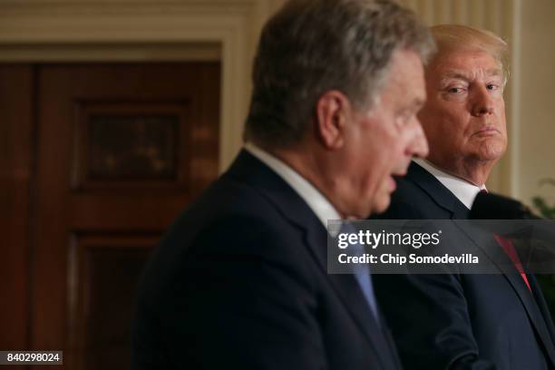 Finnish President Sauli Niinisto and U.S. President Donald Trump hold a joint news conference in the East Room of the White House August 28, 2017 in...