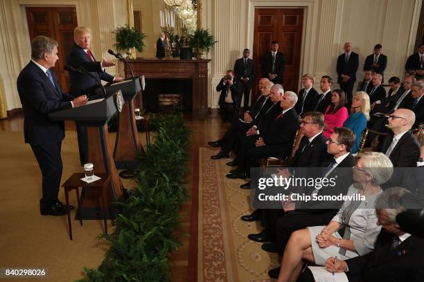 Finnish President Sauli Niinisto and U.S. President Donald Trump hold a joint news conference in the East Room of the White House August 28, 2017 in...