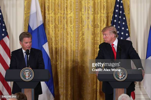 President Donald Trump and President Sauli Niinisto of Finland participate in a joint news conference at the East Room of the White House August 28,...