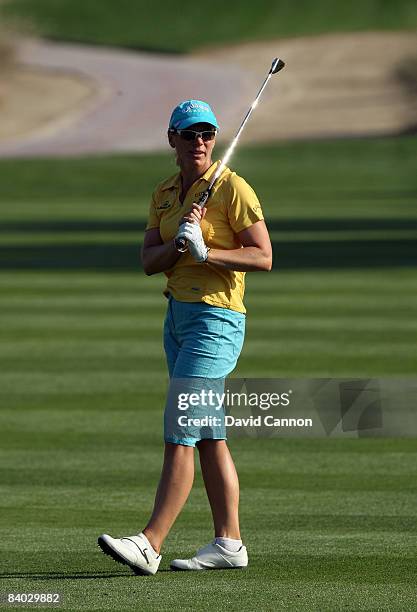 Annika Sorenstam of Sweden hits her second shot at the 16th hole during her final round before her retirement from competitive golf in the final...