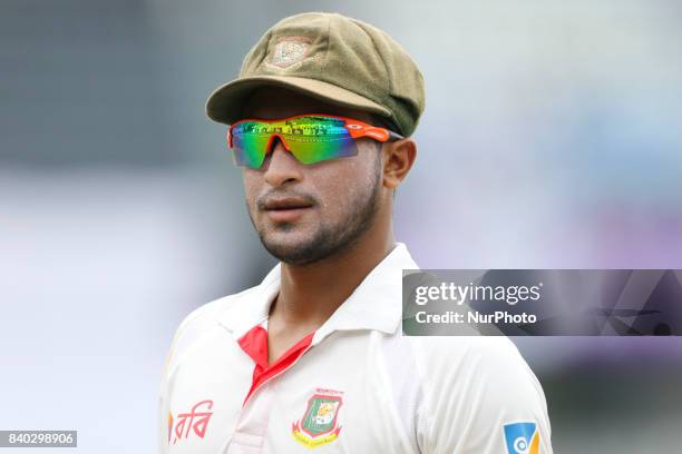 Bangladesh's Sakib Al Hasan fields against Australia during day two of the First Test match between Bangladesh and Australia at Shere Bangla National...