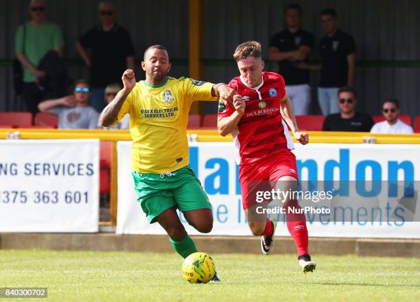 Jake Robinson of Billericay Town beats Joe Bruce of Thurrock FC during Bostik League Premier Division match between Thurrock vs Billericay Town at...