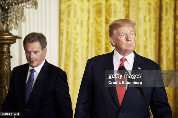 President Donald Trump, right, and Sauli Niinisto, Finland's president, arrive for a joint press conference at the White House in Washington, D.C.,...