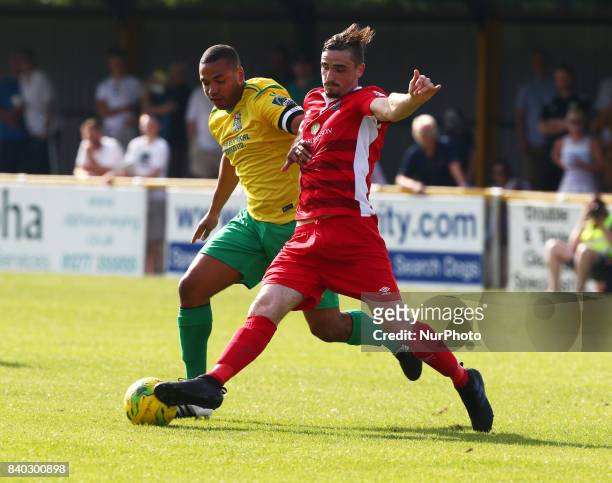 Dan Waldren of Billericay Town holds of Joe Bruce of Thurrock FC during Bostik League Premier Division match between Thurrock vs Billericay Town at...
