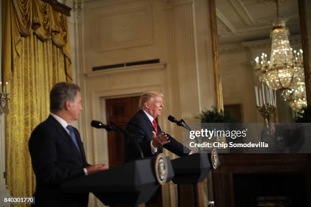 Finnish President Sauli Niinisto and U.S. President Donald Trump hold a joint news conference in the East Room of the White House August 28, 2017 in...