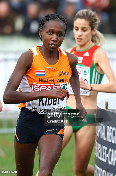 Dutch runner Hilda Kibet runs to win the women race at the