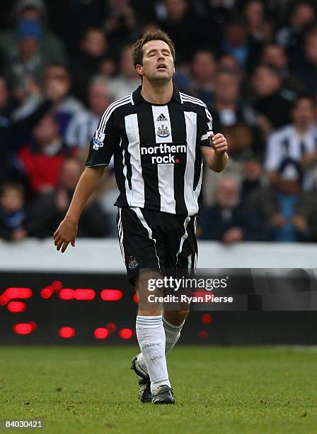 Michael Owen of Newcastle celebrates after scoring the first goal for his team during the Barclays Premier League match between Portsmouth and...