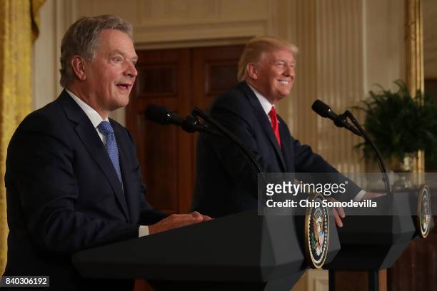 Finnish President Sauli Niinisto and U.S. President Donald Trump hold a joint news conference in the East Room of the White House August 28, 2017 in...