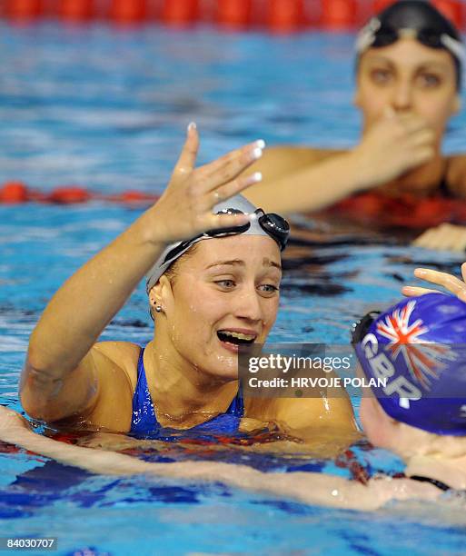 Mireia Belmonte Garcia of Spain celebrates after winning the women's 400m individual medley race setting a new world record with a time of 4 min 25...