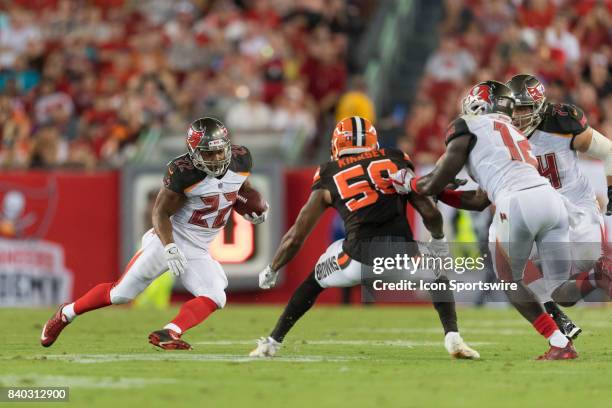 Tampa Bay Buccaneers running back Doug Martin prepares to make a cut during an NFL preseason football game between the Cleveland Browns and the Tampa...