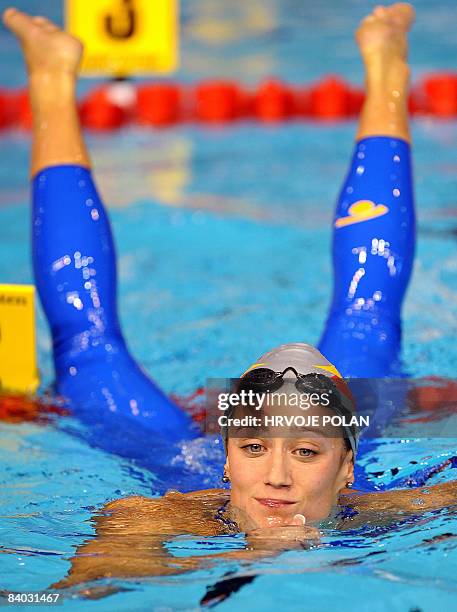 Spain's Maria Belmonte Garcia reacts after winning the women's 400m individual medley race and setting a new world record during the European Short...