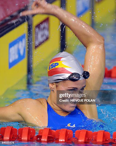 Spain's Maria Belmonte Garcia celebrates after winning the women's 400m individual medley race and setting the new world record during the European...