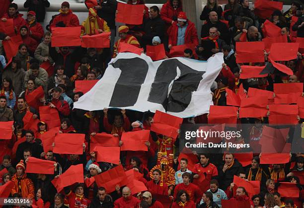 Perpignan fans welcome Dan Carter during the Heineken Cup match between Perpignan and Leicester Tigers at Stade Aime Giral on December 14, 2008 in...