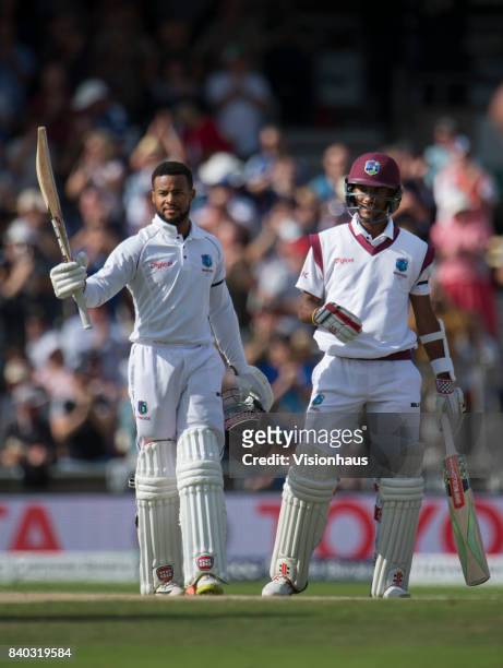 Shai Hope of West Indies is congratulated by team mate Kraigg Brathwaite during the second day of the second test between England and West Indies at...