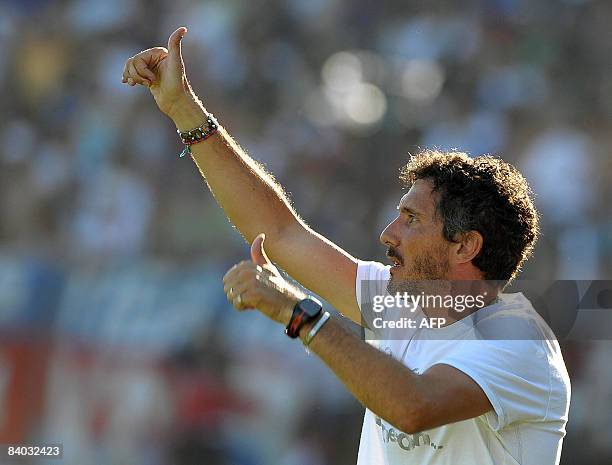 Tigre's team coach Diego Cagna gives the thumb up during their Argentina first division football match against Banfield, in Victoria, Buenos Aires...