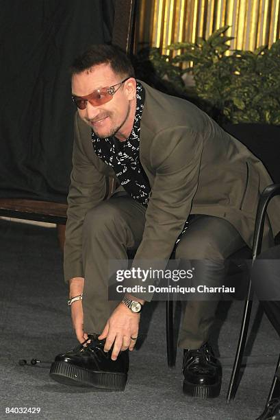 Peace Summit Award Laureate and U2 lead singer Bono attends the 9th Nobel Peace Prize World Summit at Hotel de Ville on December 12, 2008 in Paris,...