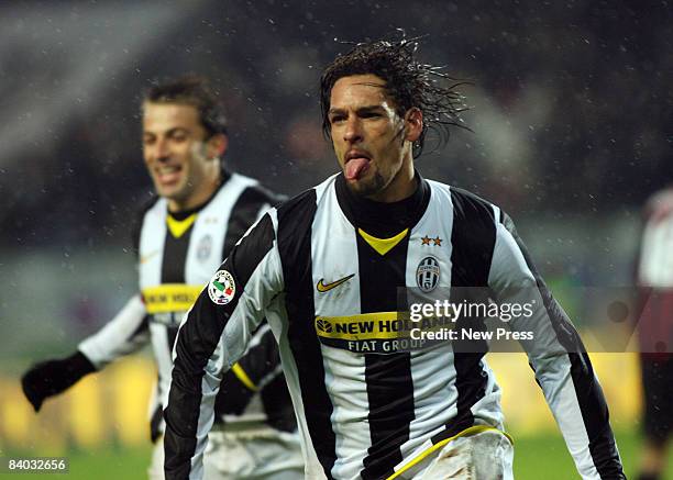 Alessandro Del Piero and Amauri of Juventus celebrate winning during the Serie A match between Juventus and AC Milan at the Stadio Olimpico on...