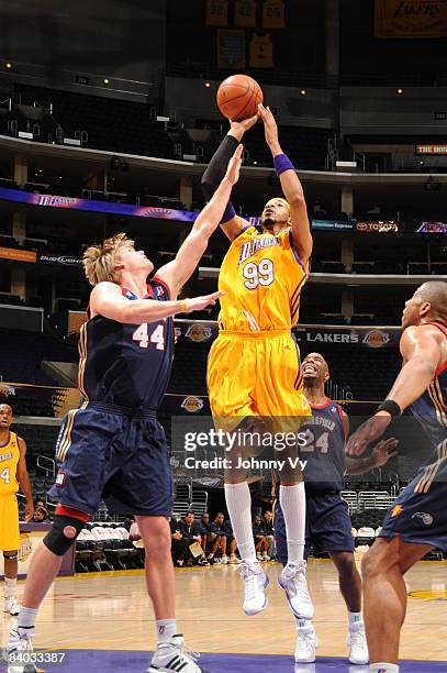 Rashid Byrd of the Los Angeles D-Fenders shoots against Nick Lewis of the Bakersfield Jam at Staples Center on December 14, 2008 in Los Angeles,...