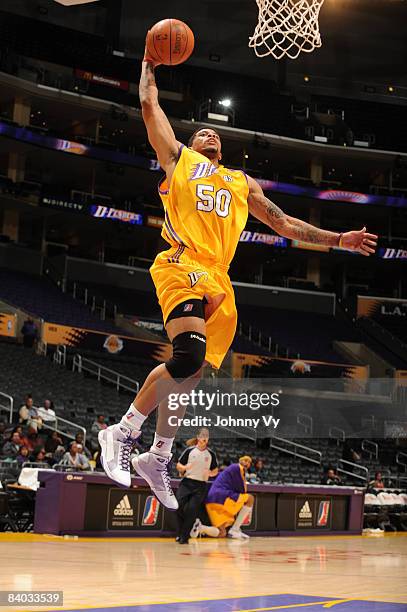Dwayne Mitchell of the Los Angeles D-Fenders goes up for a dunk during the game against the Bakersfield Jam at Staples Center on December 14, 2008 in...