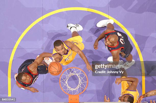 Joe Crawford of the Los Angeles D-Fenders puts up a shot against the Bakersfield Jam at Staples Center on December 14, 2008 in Los Angeles,...