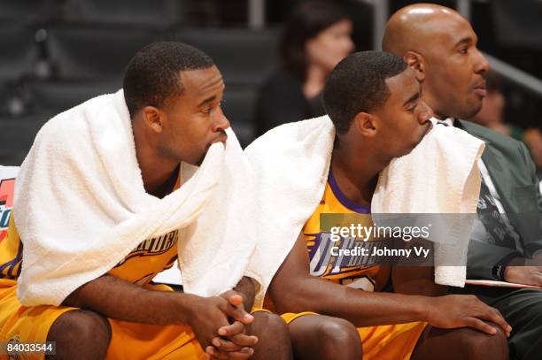 Joe Crawford and Brandon Heath of the Los Angeles D-Fenders look on from the bench during their game against the Bakersfield Jam at Staples Center on...
