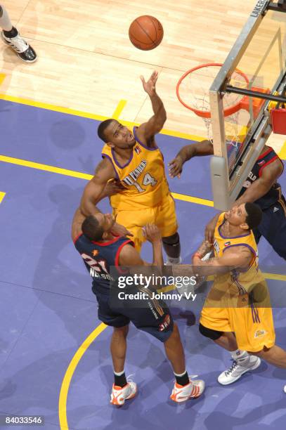 Joe Crawford of the Los Angeles D-Fenders goes up for a shot against DeMarcus Nelson of the Bakersfield Jam at Staples Center on December 14, 2008 in...