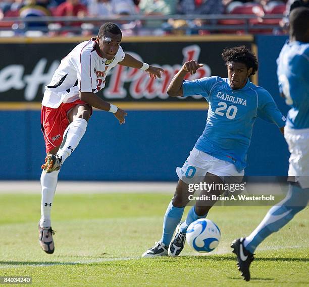 Rodney Wallace of the Maryland Terrapins fires a shot past Sheanon Williams of the North Carolina Tar Heels during first half action at the 2008 NCAA...