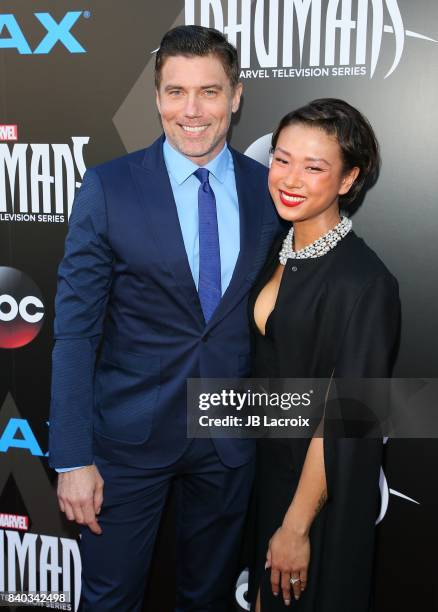 Anson Mount and Darah Trang attend the world premiere of "Inhumans" at Universal CityWalk on August 28, 2017 in Universal City California.