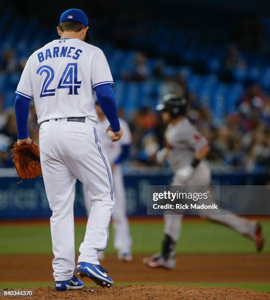 Toronto Blue Jays relief pitcher Danny Barnes on the mound after giving up a 2 run home run. Toronto Blue Jays Vs Boston Red Sox in MLB regular...