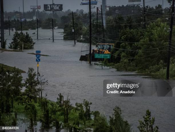 High levels of flood submerges a road after Hurricane Harvey hit Conroe, TX, United States on August 28, 2017.