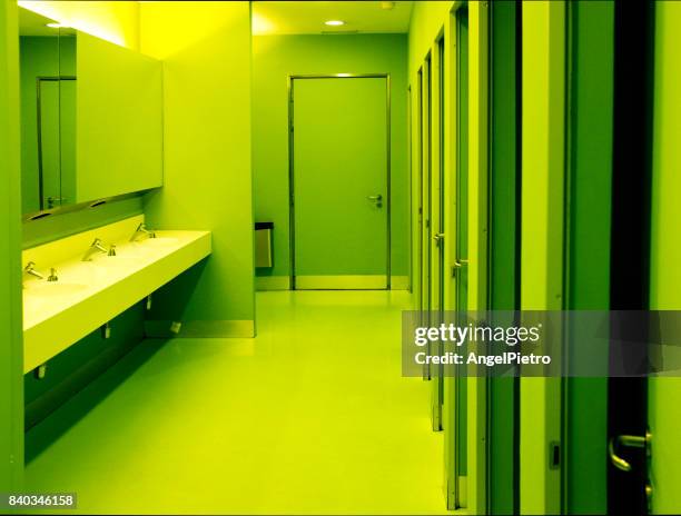 green toilettes - toilettes stock pictures, royalty-free photos & images