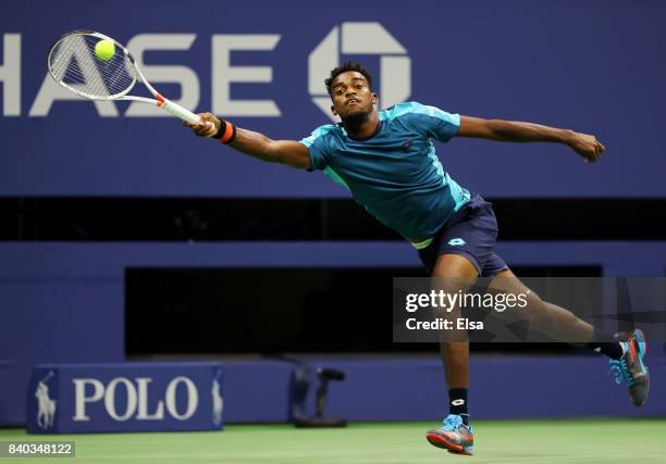 Darian King of Barbados returns a shot to Alexander Zverev Jr. Of Germany during their first round Men's Singles match on Day One of the 2017 US Open...