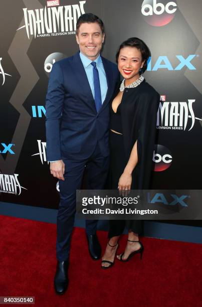 Actor Anson Mount and Darah Trang attend the premiere of ABC and Marvel's "Inhumans" at Universal CityWalk on August 28, 2017 in Universal City,...