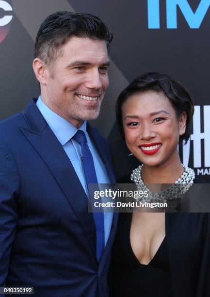 Actor Anson Mount and Darah Trang attend the premiere of ABC and Marvel's "Inhumans" at Universal CityWalk on August 28, 2017 in Universal City,...