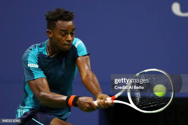 Darian King of Barbados returns a shot to Alexander Zverev Jr. Of Germany during their first round Men's Singles match on Day One of the 2017 US Open...