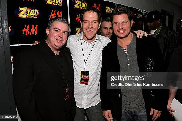 Elvis Duran, Z100 DJ Froggy and singer Nick Lachey pose backstage during Z100's Jingle Ball 2008 Presented by H&M at Madison Square Garden on...